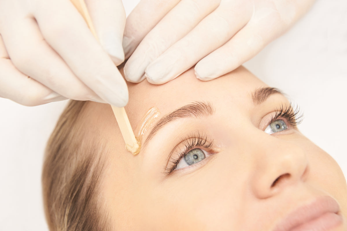 beauty treatment waxing eyebrows